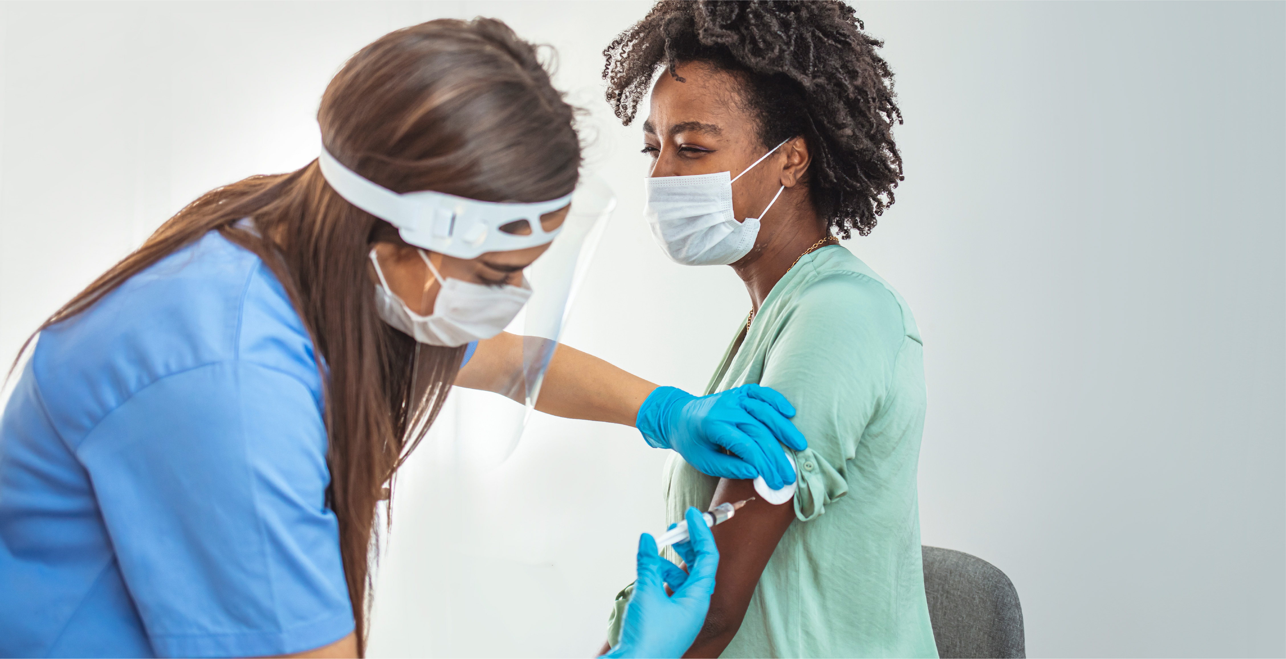Woman receiving vaccination