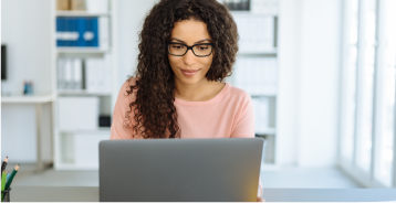 Woman busy with laptop