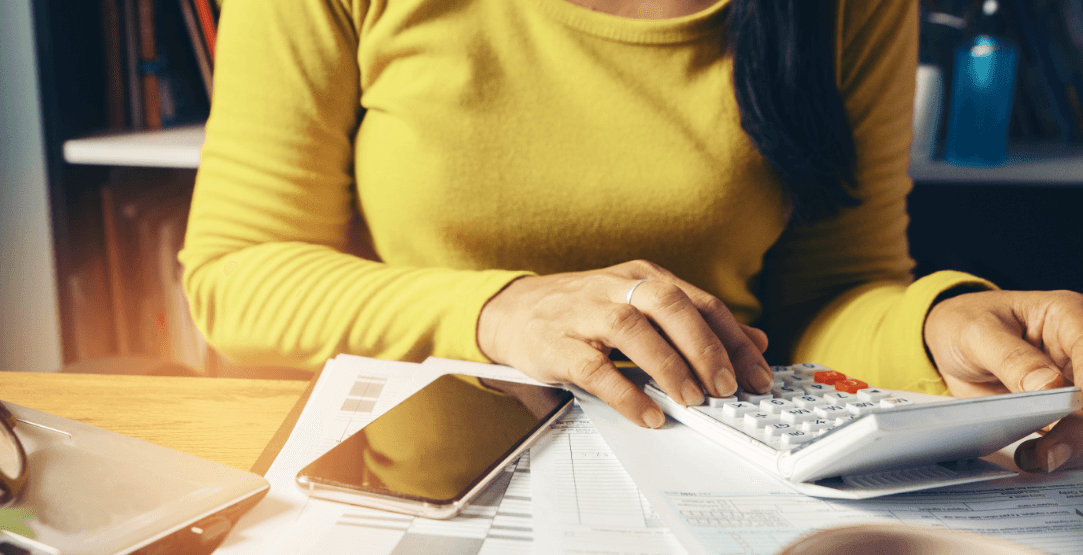 Lady busy with calculator