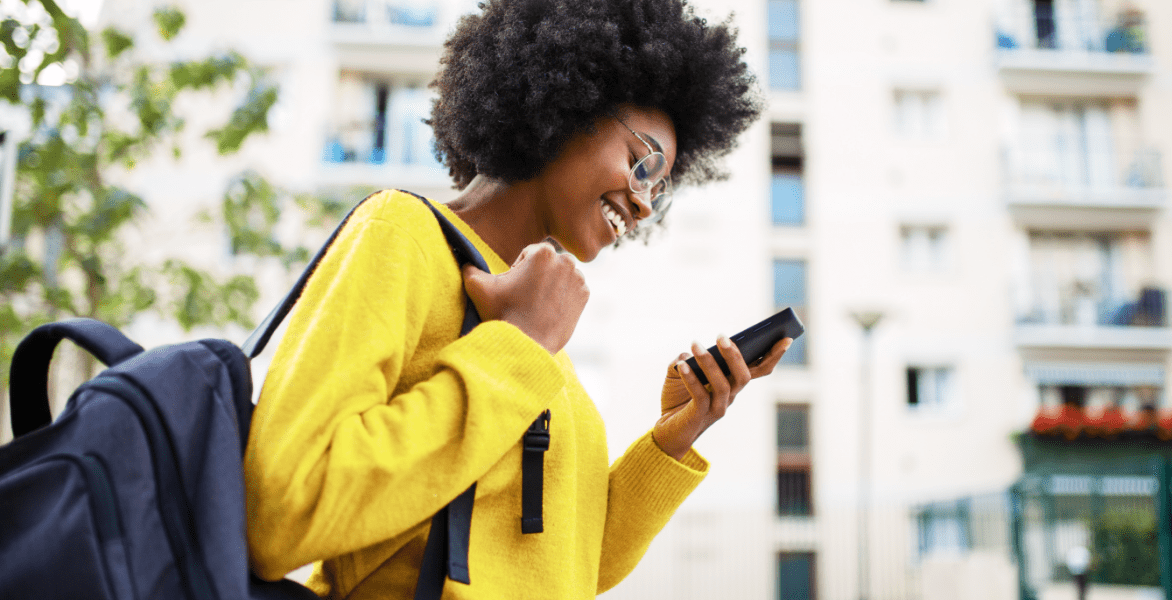 Women in yellow smiling