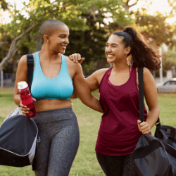 Friends gyming outdoors